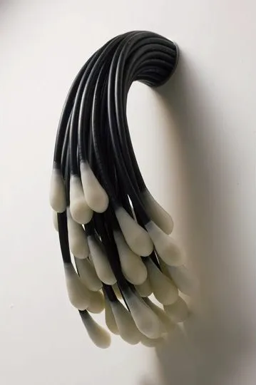 Animus 2011; 75cm x 27cm x 28cm; air compressor hose, wax, steel bracket Animus 2011; 75cm x 27cm x 28cm; air compressor hose, wax, steel bracket