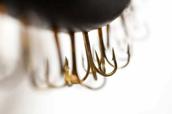 Collar 2013; 87cm x 40cm x 4cm; found cable, large fish hooks