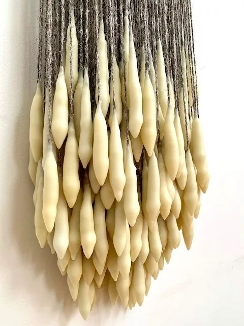 Drop I, wax, wool, iron ring, leather strap