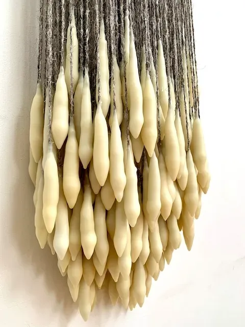 Drop I, wax, wool, iron ring, leather strap