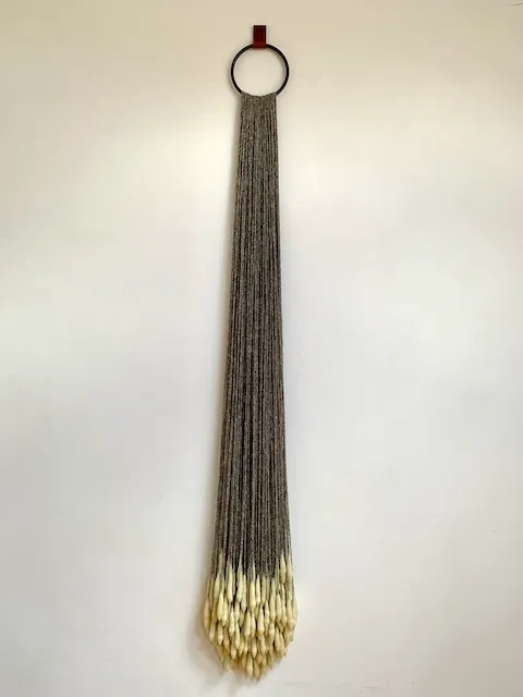 Drop I, wax, wool, iron ring, leather strap