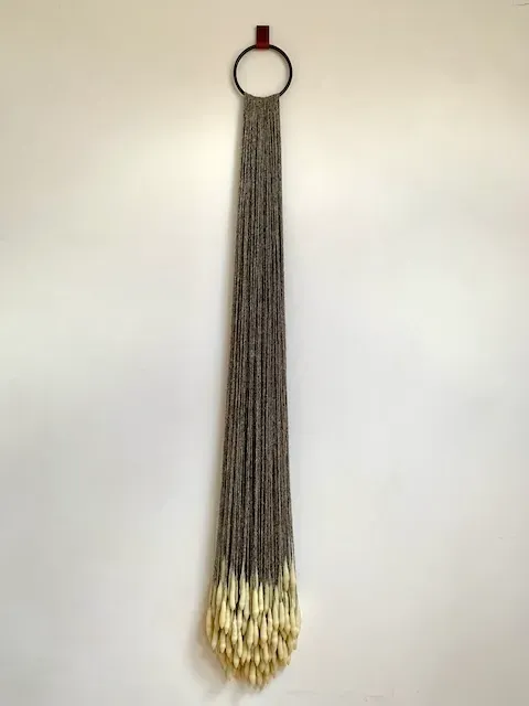 Drop I, wax, wool, iron ring, leather strap