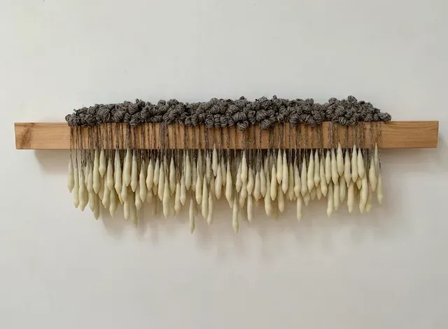 Drop II, wax, wool, wood, elastic cord