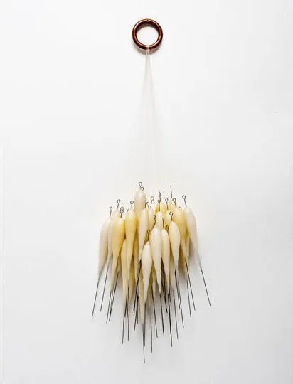 Harem 2013; 65cm x 25cm x 15cm; copper bull ring, violin bow hair, wax, steel pins Harem 2013; 65cm x 25cm x 15cm; copper bull ring, violin bow hair, wax, steel pins