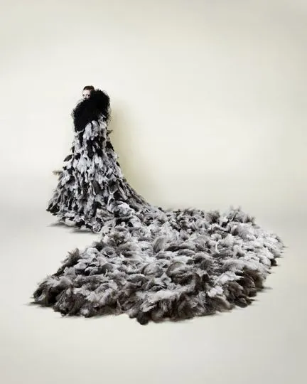 Icarus 2012

Ostrich Feathers

Bird Netting

Flight Harness

Copper Wire (private collection)

WWF commissioned a collection of works from leading artists, designers and architects for Padamonium in Hyde Park. The pieces were intended to inspire awareness of WWF's breadth of work.

Curated by Artwise, each artist contributed a piece of wearable sculpture or performance. The Pandamonium collection included fashion, textile, interaction, millinery and music. The works were auctioned during an open air catwalk show to raise funds and highlight the work of the WWF.

<a href="http://artwisecurators.com/projects/wwf-pandamonium-2/" target="_blank">artwisecurators pandamonium</a>