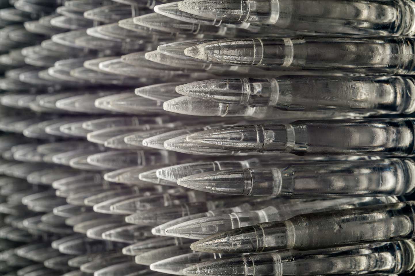 Pandora 2016; LED lightbox within doorframe; clear cast resin 50. cal Browning bullets