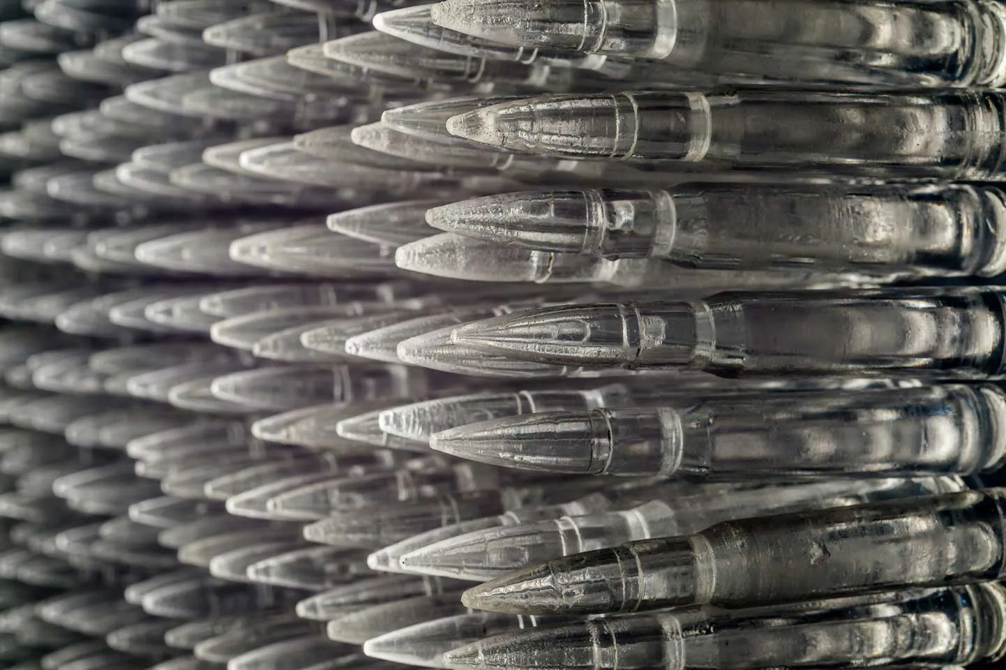 Pandora 2016; LED lightbox within doorframe; clear cast resin 50. cal Browning bullets