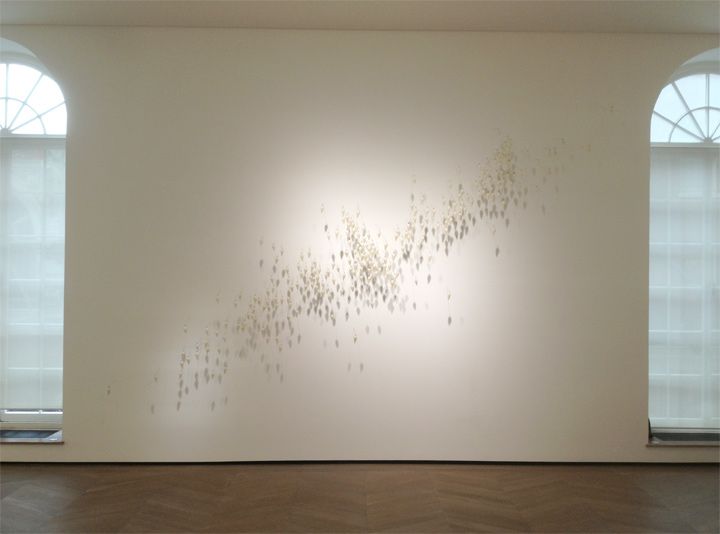 Siblings 2013; dimensions variable, fish hooks, wax, steel pins